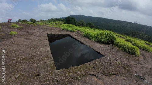 Engineering of the Ancients: Detailed View of a Carved Water Reservoir Used for Monastic Drinking Supply at the Historic Kanheri Caves Complex, Mumbai, India 