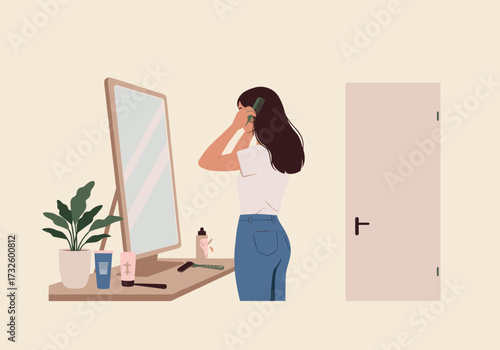 Woman talking on phone in front of mirror home interior digital calm environment side view self-care concept