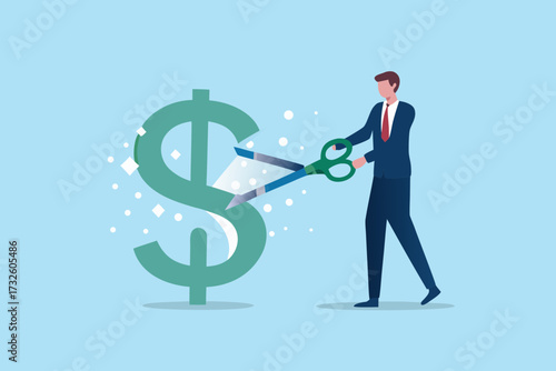 Businessman cutting a large dollar sign with scissors symbolizing financial cuts or cost reduction