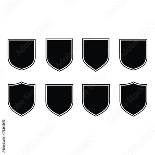 Collection of eight unique black shield silhouettes for emblems heraldry and design projects silhouette