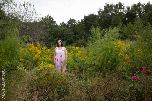 Woman in wildflower meadow 3