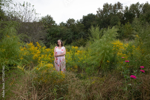 Woman in wildflower meadow 3