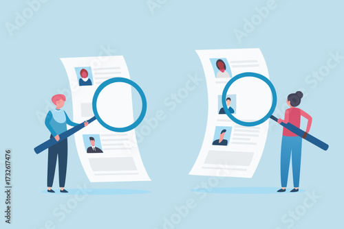Two people examining resumes with magnifying glasses in a hiring process