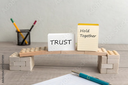 A wooden bridge supported by blocks showing trust and togetherness