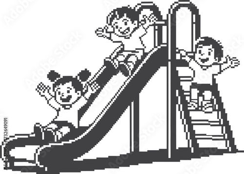 Happy children playing and sliding down a playground slide