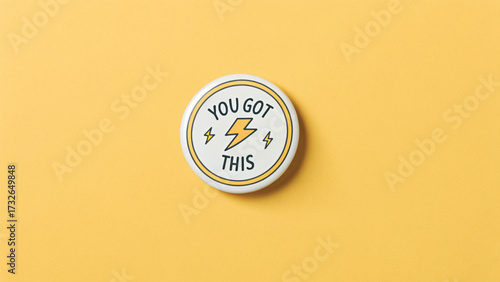 Round Pin Button With Lightning Bolt And Motivational Text