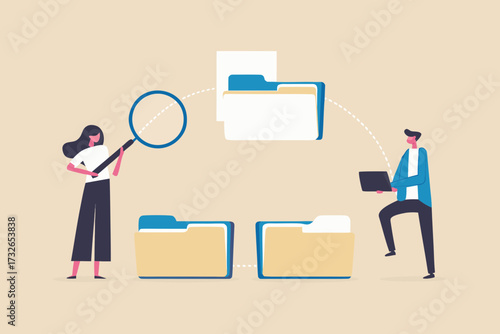 Two people organizing and searching through digital files and data using technology and magnifying glass