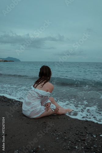 Woman by the sea very emotional
