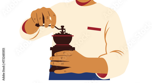 Person grinds coffee with a manual, vintage-style grinder