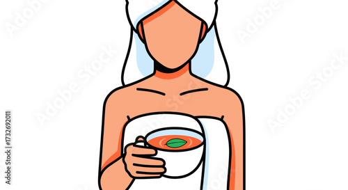 Woman in a towel holding a warm cup of tea after a bath.