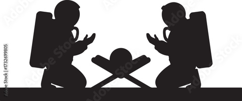 Black silhouette of two figures kneeling around a manger scene nativity scene black and white