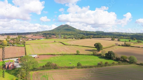 The Wrekin hill in Shropshire, UK a local landmark with an Historic Iron Age Fort at the summit, rising to reveal surrounding countryside