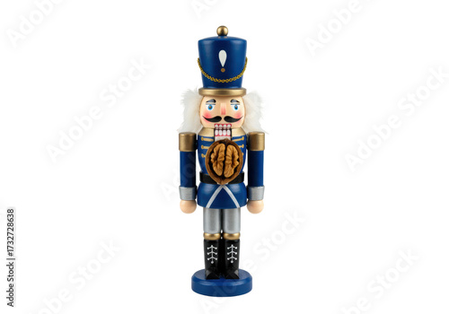 Isolated wooden toy figurine Christmas nutcracker with nut in mouth for decoration souvenir
