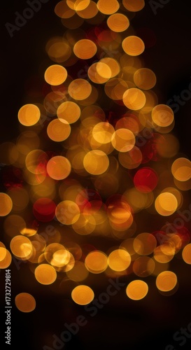 Festive Christmas tree illuminated with warm lights at night  