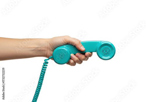 Isolated hand holding cyan telephone receiver from the 1960s era ~Communication