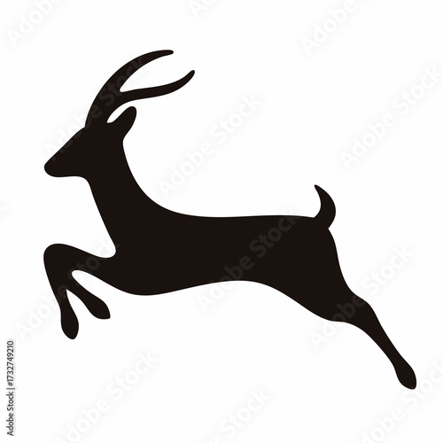 Black silhouette of a jumping horned antelope isolated on a white background