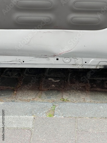 Damage on a car side skirt