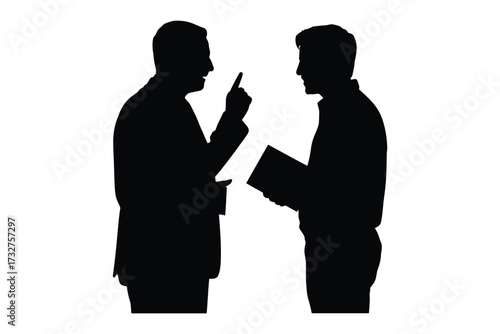 Silhouetted businessmen in conversation with one man gesturing emphatically