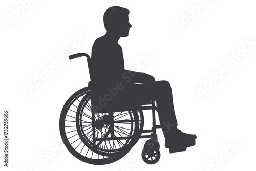 Silhouette of a person sitting in a wheelchair