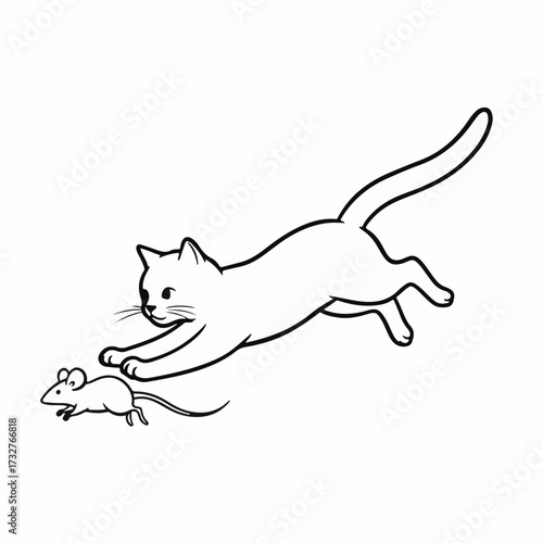 Playful kitten pounces on a tiny mouse in a moment of chase