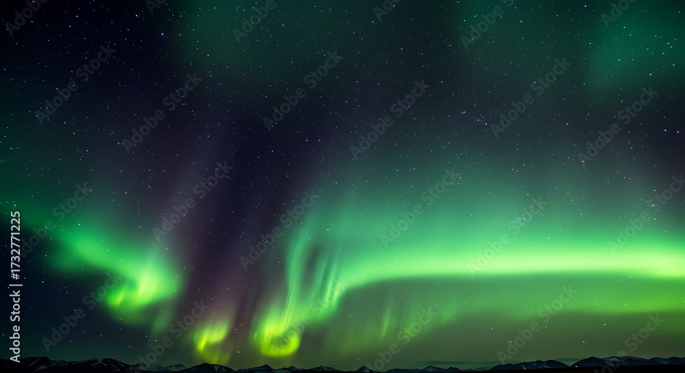 Naklejka premium Vibrant aurora borealis display in the night sky with dynamic green hues