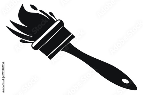 Single paint brush displays bristles with liquid dropping in a solid black silhouette