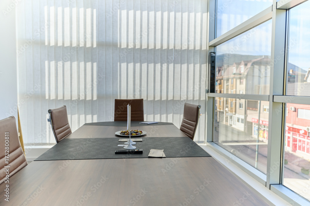Fototapeta premium Modern Office Interior with Wooden Furniture, Conference Table, and Computers