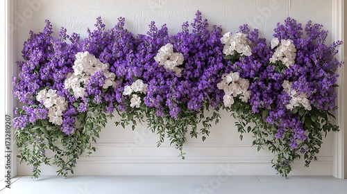 Elegant wall arrangement with purple flowers high resolution image