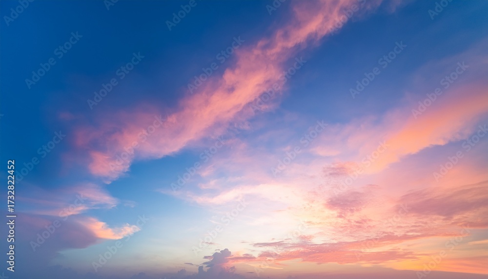 Obraz premium Twilight Sky With Effect Of Light In Pastel Pink Coral Orange Blue Tones Colorful Sunset Of Soft Clouds Background Square