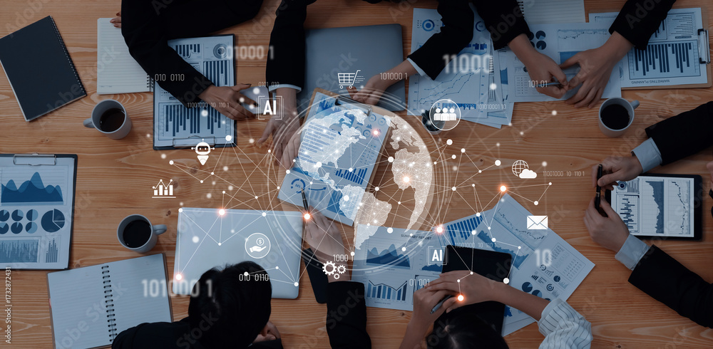 © InfiniteFlow - A team of professionals engages in a collaborative business meeting, analyzing data on charts and documents while surrounded by technology and global connectivity visuals. Trope
