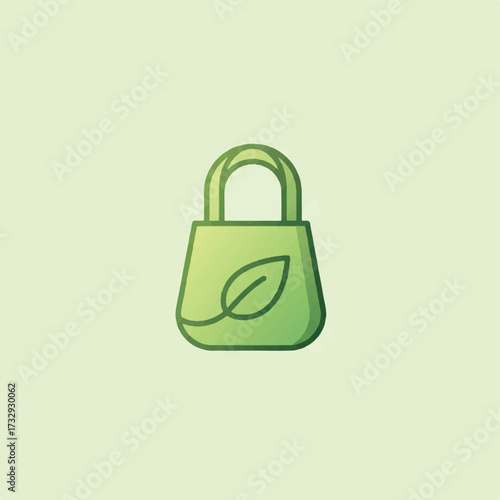 A green tote bag with a leaf design on a light green background