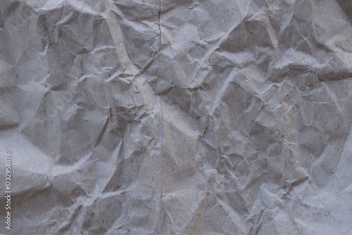 Brown crumpled recycled paper texture background. Kraft Paper