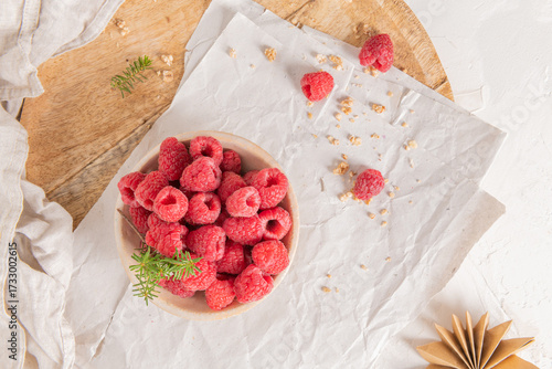 Wallpaper Mural Two glasses of layered raspberry and chia seed pudding topped with fresh raspberries and white crowberry on a rustic wooden platter Torontodigital.ca