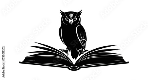 Wise owl perched atop open book depicting intelligence through knowledge and learning
