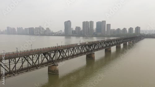 Aerial view of Hangzhou dual-purpose bridge, carrying both railway and highway across the river.China. High quality 4k footage