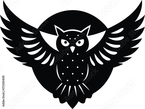 an owl spreading wings in flight under the moonlig