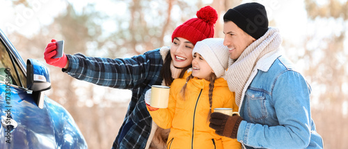 Happy family taking selfie ...