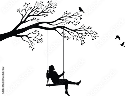 Silhouette of a person swinging on a tree swing under a large bare tree with birds flying in the sky