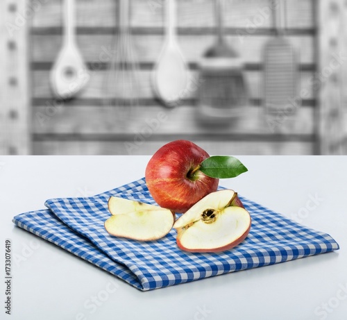 Red fresh ripe apple on desk