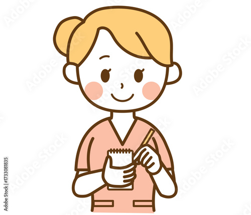 メモを取る看護師の女性