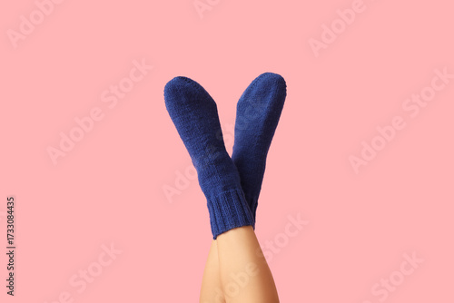 Cozy blue knitted socks on ...
