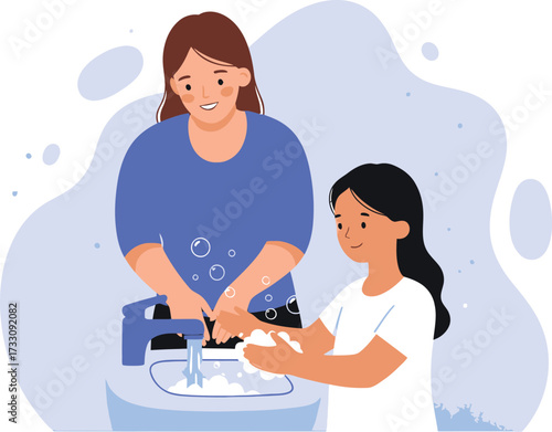 Mother and daughter happily washing hands together at home emphasizing hygiene and healthy habits for family wellness