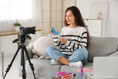 Young asian woman vlogger r...