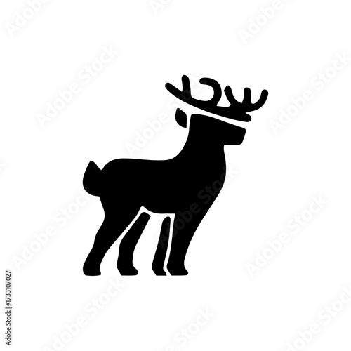 Silhouette of a deer with antlers standing gracefully in black and white, perfect for design