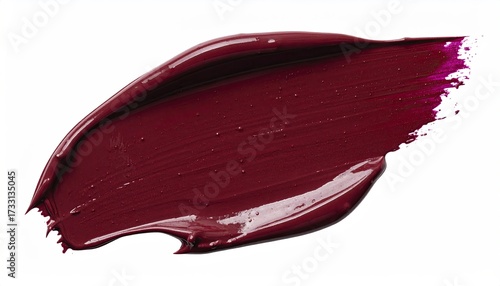 Swatch of deep burgundy paint or cosmetic against a plain white background