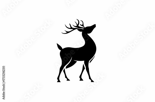 Majestic deer stag with impressive antlers looking skyward, elegant black silhouette of a wild forest animal on white background
