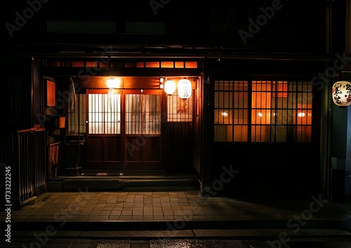 Wallpaper Mural Dark night view of a traditional Japanese restaurant. Wooden storefront illuminated by warm light from within Torontodigital.ca
