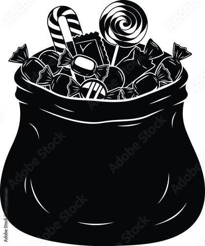 Black bag overflowing with candy lollipops and sweets for trick or treating
