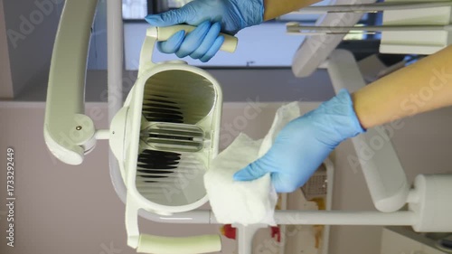 Cleaning and disinfection facility in dentistry. preparing dental equipment for procedure. Checkup of medical tools in modern dentist office. Vertical footage. Cleaning and disinfection facility in
