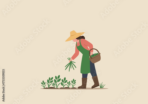 A farmer wearing a straw hat and apron harvests fresh produce from a garden, carrying a basket filled with vegetables.